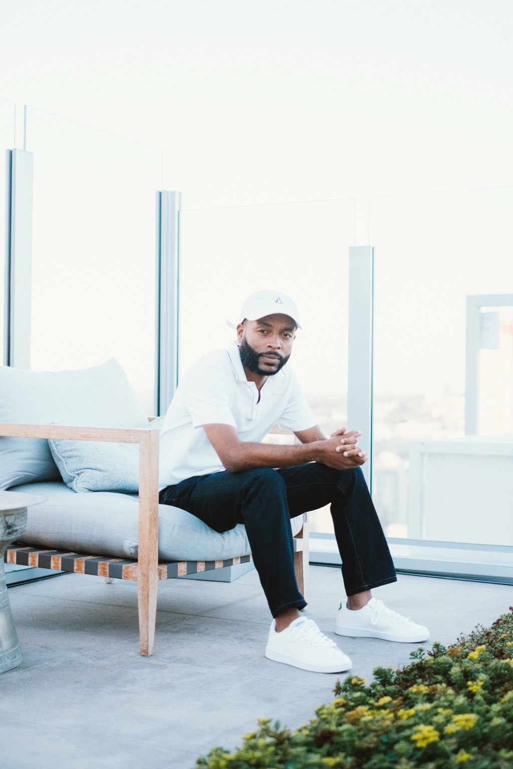 Anthony seated outdoors in San Diego